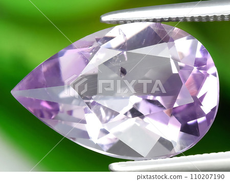 natural purple amethyst gem on the background 110207190