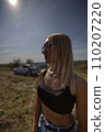 A beautiful girl is waiting for evening rest from work and bustle, serenity and freedom. Escape from problems and a chance to be alone. High quality photo 110207220