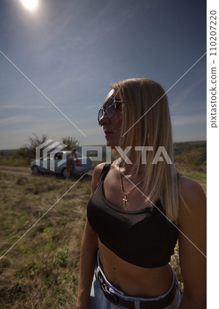 A beautiful girl is waiting for evening rest from work and bustle, serenity and freedom. Escape from problems and a chance to be alone. High quality photo A beautiful girl is waiting for evening rest from work and bustle, serenity and freedom. Escape from problems and a chance to be alone. High quality photo 110207220