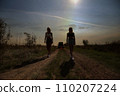 an accident on the road, a car broke down, two beautiful girl models are waiting. A problem with the car. Friends waiting for service. In the countryside . High quality photo 110207224
