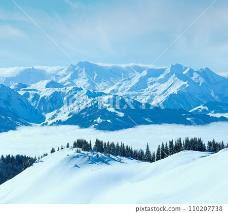 Cloudy sunny winter mountain landscape Cloudy sunny winter mountain landscape 110207738