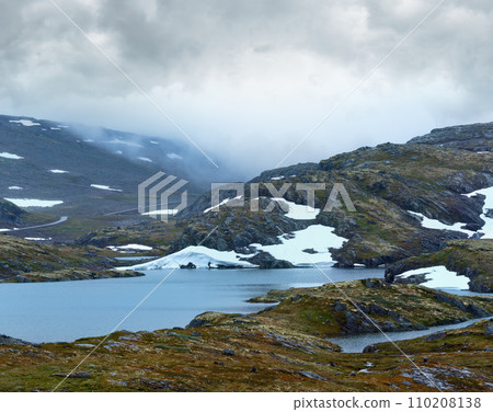 Summer mountain with lake and snow (Norway) 110208138