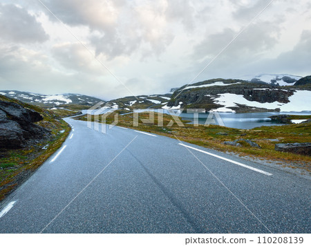Summer mountain with lake and road (Norway) 110208139