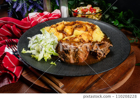 Stewed pork neck in sauce. 110208228