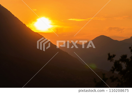 Colorful sunset on top of Italian mountain alps. Beautiful mountain landscape Colorful sunset on top of Italian mountain alps. Beautiful mountain landscape 110208675