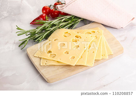 Sliced maasdam cheese with holes 110208857