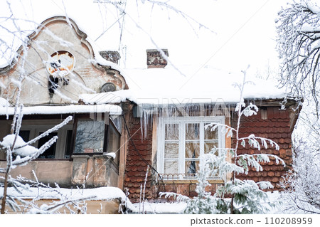 Rustic windows with icicles in winter Rustic windows with icicles in winter 110208959