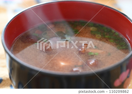 Hot, steaming miso soup with nameko mushrooms Hot, steaming miso soup with nameko mushrooms 110209862