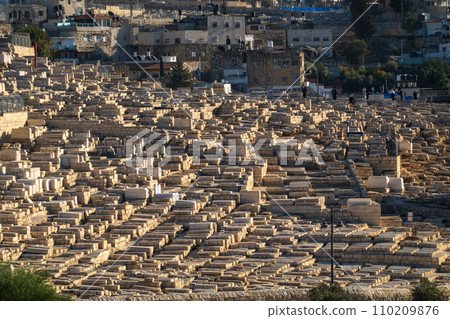 Vast Jewish cemetery on Jerusalem's hillside, a symbol of enduring respect and tradition 110209876