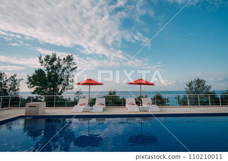 White resort hotel pool under the blue sky 110210011