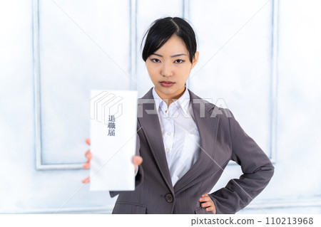 Career woman submitting resignation letter Career woman submitting resignation letter 110213968