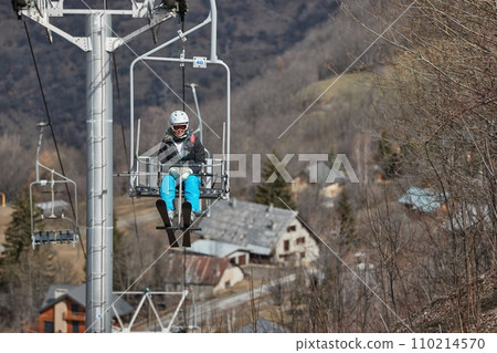 Ski lift at a ski resort with lack of snow 110214570