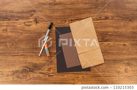 Flat lay. A dedicated teacher brings paper puppets to life, fostering creativity in the classroom through hands-on projects. Flat lay. A dedicated teacher brings paper puppets to life, fostering creativity in the classroom through hands-on projects. 110215303