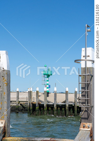 By the sea along the pier with a light house By the sea along the pier with a light house 110216180