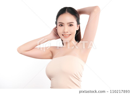 Beautiful Young Asian woman lifting hands up to show off clean and hygienic armpits or underarms on white background, Smooth armpit cleanliness and protection concept Beautiful Young Asian woman lifting hands up to show off clean and hygienic armpits or underarms on white background, Smooth armpit cleanliness and protection concept 110217893