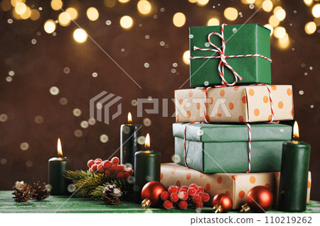 Christmas gift boxes with decoration on the table Christmas gift boxes with decoration on the table 110219262