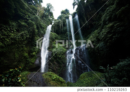 View of jungle waterfall cascade in tropical rainforest View of jungle waterfall cascade in tropical rainforest 110219263