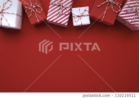 Gift boxes on color background, flat lay, space for text Gift boxes on color background, flat lay, space for text 110219311