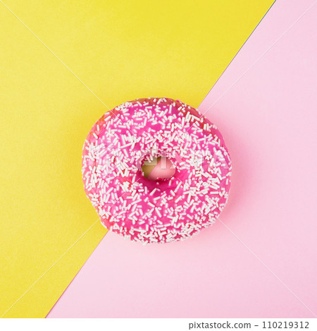 Pink donut on color background, flat lay, top view Pink donut on color background, flat lay, top view 110219312