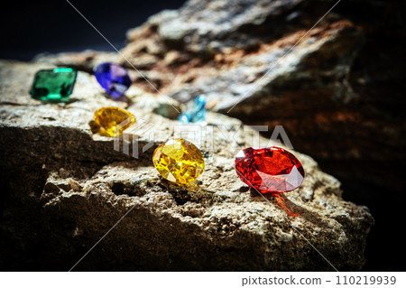 Natural Sapphire gemstone, Jewel or gems on stone background Natural Sapphire gemstone, Jewel or gems on stone background 110219939