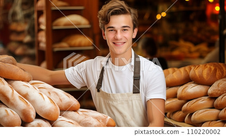 Friendly and Welcoming Salesman Assisting Customers with a Warm Smile at the Bakery Counter Friendly and Welcoming Salesman Assisting Customers with a Warm Smile at the Bakery Counter 110220002