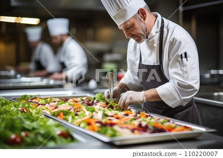 Talented Male Chef Skillfully Preparing and Cooking Gourmet Dishes in a Modern Kitchen Setting Talented Male Chef Skillfully Preparing and Cooking Gourmet Dishes in a Modern Kitchen Setting 110220007