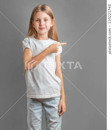 Happy and cute girl showing or endorsing company or product 110221748