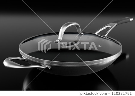 Stainless steel frying pan with glass lid and chrome cookware on black Stainless steel frying pan with glass lid and chrome cookware on black 110221791