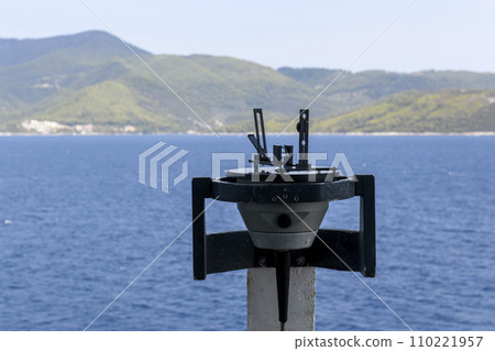 Azimuth ring on gyro compass. Direction finder on the navigational bridge. Azimuth vane. Bearing finder. Navigational equipment. Azimuth ring on gyro compass. Direction finder on the navigational bridge. Azimuth vane. Bearing finder. Navigational equipment. 110221957