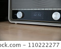 Beige retro kitchen radio with time on the LCD display 110222277