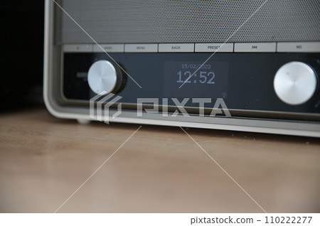 Beige retro kitchen radio with time on the LCD display Beige retro kitchen radio with time on the LCD display 110222277