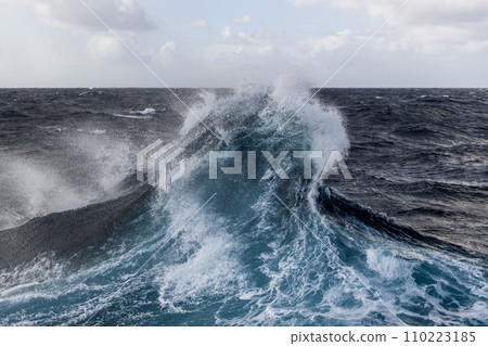 Big waves with beautiful lighting. Stormy sea, Bad weather. Gale. Rough sea. Beaufort scale 6. Big waves with beautiful lighting. Stormy sea, Bad weather. Gale. Rough sea. Beaufort scale 6. 110223185