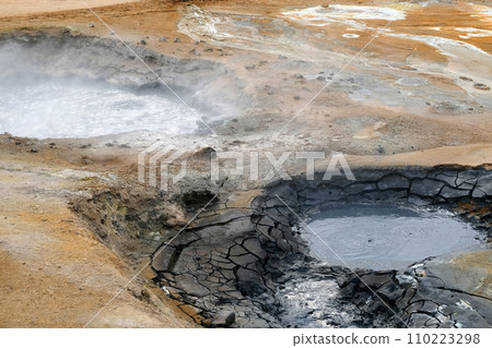 Boiling mud pots in the geothermal area of Iceland Boiling mud pots in the geothermal area of Iceland 110223298