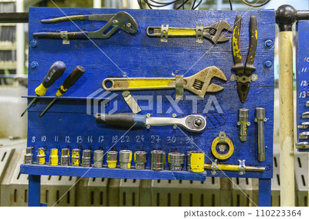 Instrument board on vessel. Spanners. Engine room interior. 110223364