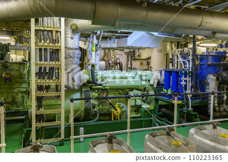 Marine engine. Diesel generator. Engine room interior. 110223365