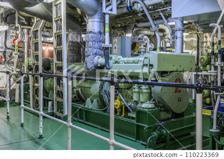 Marine engine. Diesel generator. Engine room interior. 110223369