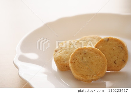 Round cookies on a white plate 2 Round cookies on a white plate 2 110223417