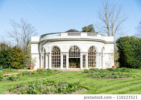 A historic flower house with white walls under a clear blue sky in Osterley Park on the outskirts of London A historic flower house with white walls under a clear blue sky in Osterley Park on the outskirts of London 110223521
