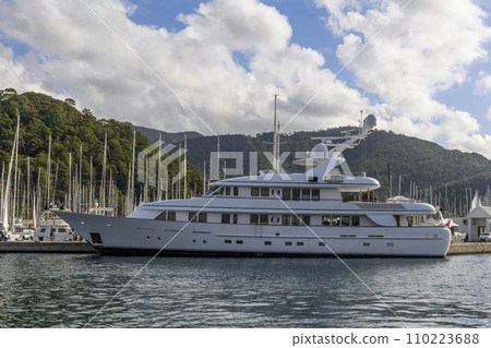 Luxury super yacht moored alongside in marina. Motor yacht. Large mega yacht. Yachting concept. Luxury super yacht moored alongside in marina. Motor yacht. Large mega yacht. Yachting concept. 110223688