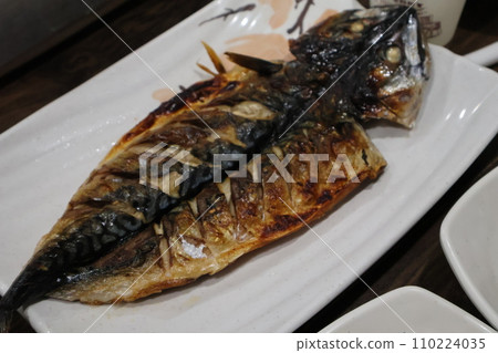 Korean food. Grilled mackerel on a plate Korean food. Grilled mackerel on a plate 110224035