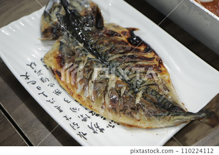 Korean food. Grilled mackerel on a plate 110224112