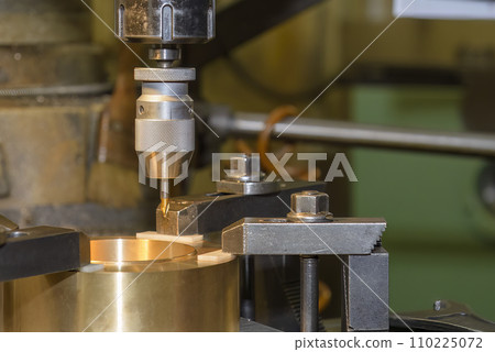The drilling process on NC milling machine with brass material. 110225072