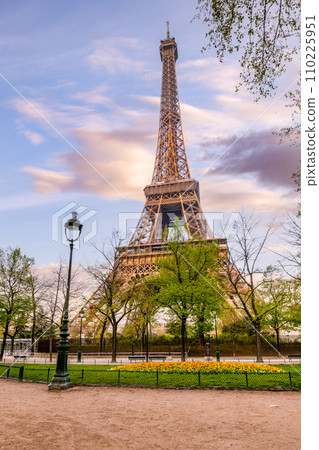 Sunny morning in the park at Eiffel Tower, Paris, France Sunny morning in the park at Eiffel Tower, Paris, France 110225951