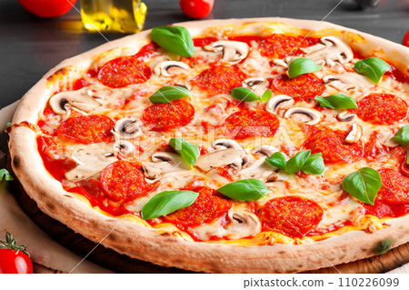 Pizza. Homemade pizza. Delicious pizza. Freshly made Italian margherita pizza with buffalo mozzarella and basil. Pizza with cheese, tomato sauce. Wood oven. World Pizza Day. February 9. 2024. 110226099