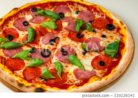 Pizza. Homemade pizza. Delicious pizza. Freshly made Italian margherita pizza with buffalo mozzarella and basil. Pizza with cheese, tomato sauce. Wood oven. World Pizza Day. February 9. 2024. 110226141