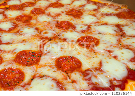 Pizza. Homemade pizza. Delicious pizza. Freshly made Italian margherita pizza with buffalo mozzarella and basil. Pizza with cheese, tomato sauce. Wood oven. World Pizza Day. February 9. 2024. 110226144