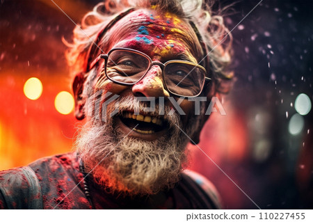 Portrait of old man in colorful powder on indian street, Holi festival 110227455