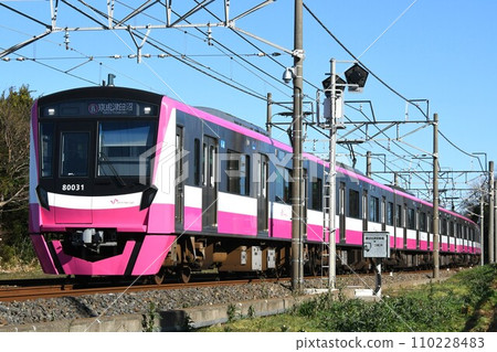 Shin-Keisei Electric Railway Type 80000 traveling on a straight section towards Keisei Tsudanuma 110228483