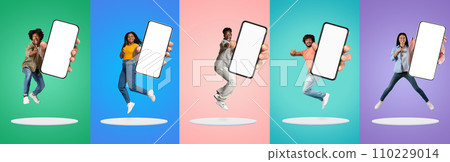 Mobile Mockup. Cheerful Multiethnic People Demonstrating Big Blank Smartphones With White Screen Mobile Mockup. Cheerful Multiethnic People Demonstrating Big Blank Smartphones With White Screen 110229014