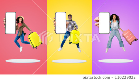 Group Of Tourists Showing Phone With Blank Screen And Jumping With Suitcase 110229022